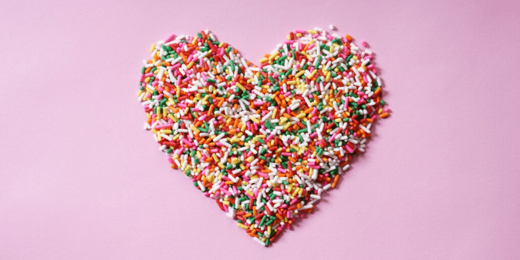 sprinkle candy in the shape of a heart