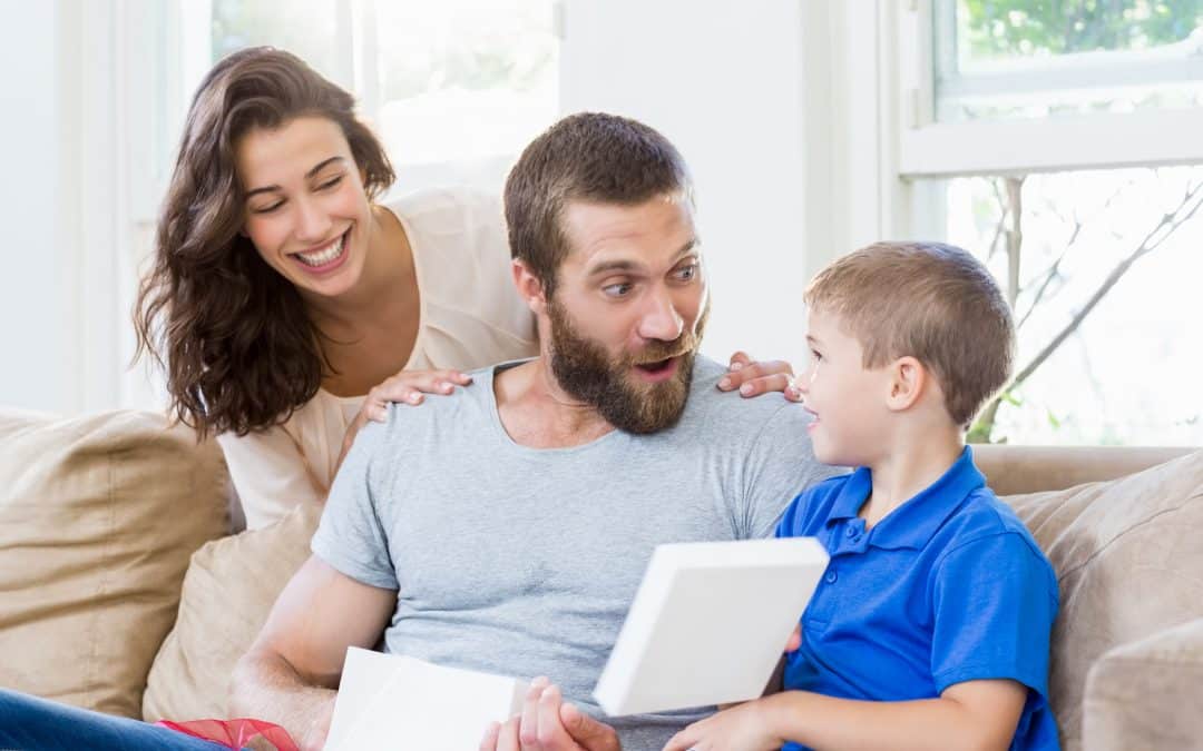 Dad with his wife and child